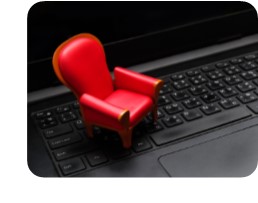 Downloadable Movies-Comfy Chair on Keyboard-copyright weedezign/Fotolia.com